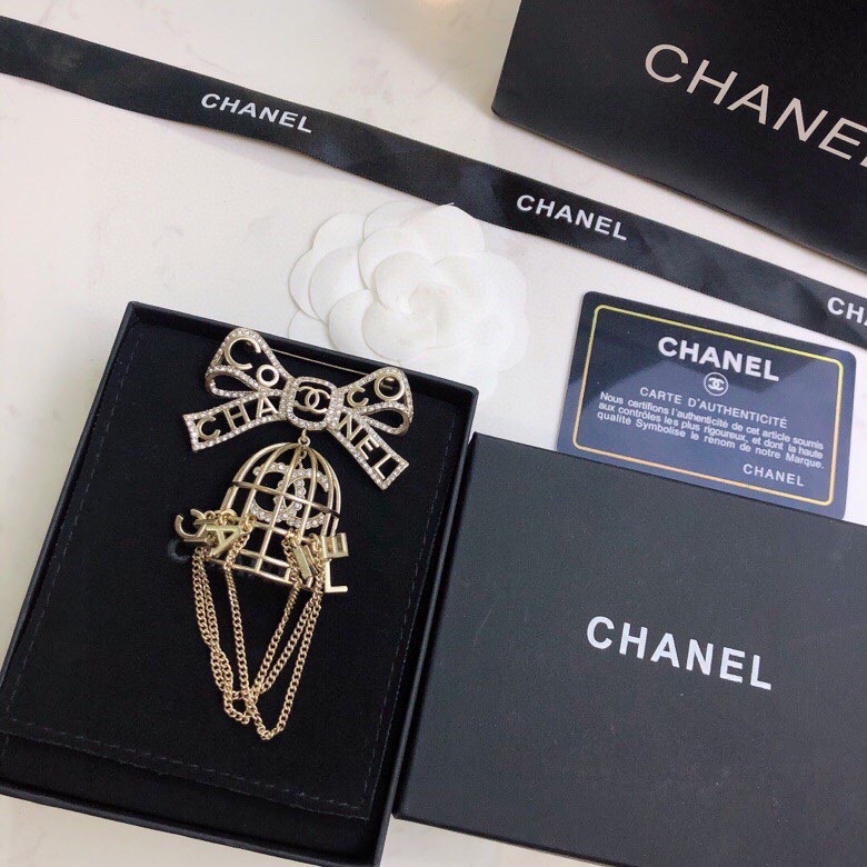 Ch*el brooches